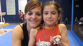 Oréane et Morgane Tato Gonzalez, son entraîneur de gym en 2008